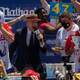 Joey Chestnut (left)